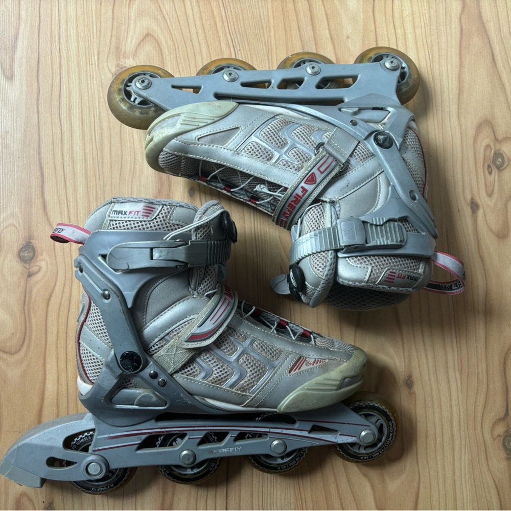 Gray Youth Firefly Rollerblades with Red Accents